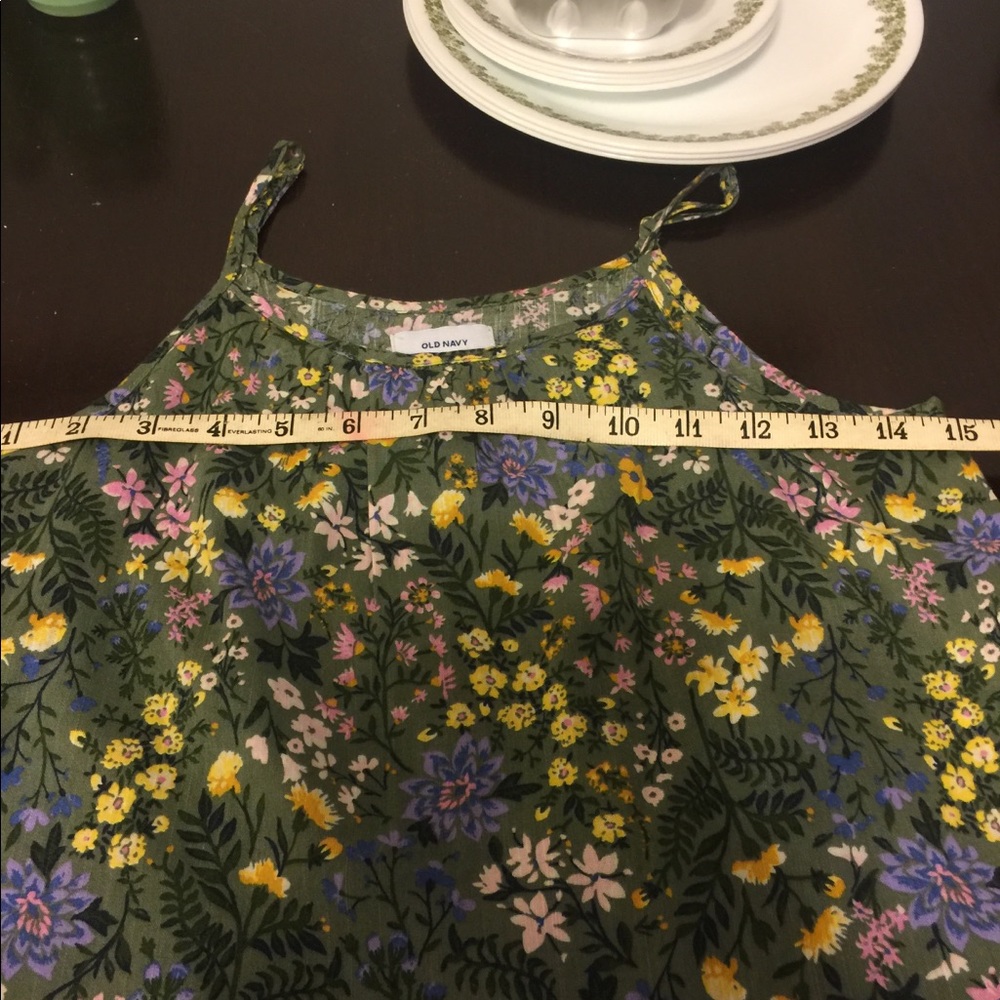 Old Navy top. It says L ( 10-12)